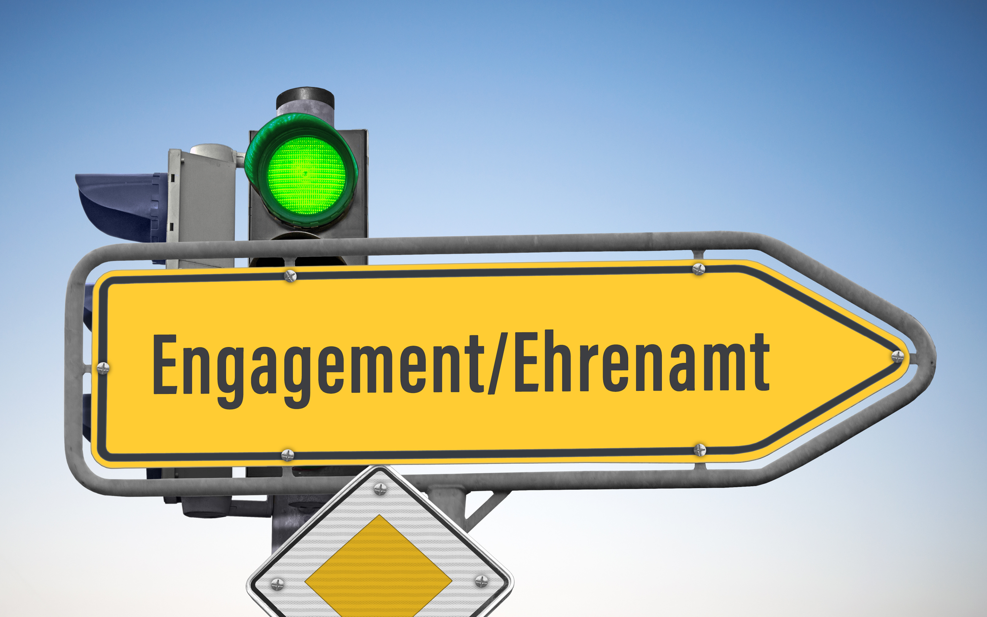 Symbolbild für Engagement und Ehrenamt: Eine grüne Ampel zeigt ‚Grün‘ – als Zeichen für Aufbruch, Unterstützung und Anerkennung freiwilligen Engagements.